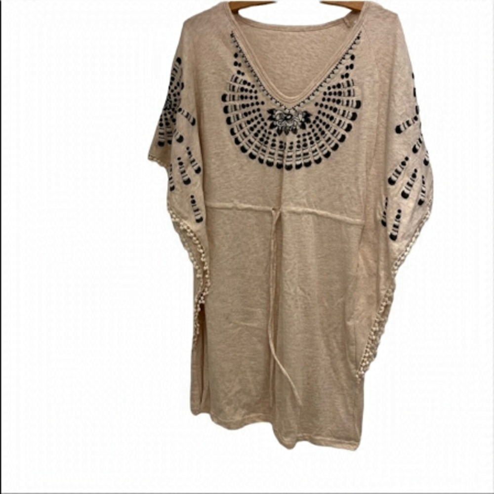 Boho dress size medium ( no size in the dress
According to measurement)